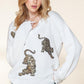 White Sequin Tiger Print Raw Hem Drop Shoulder Knit Sweater